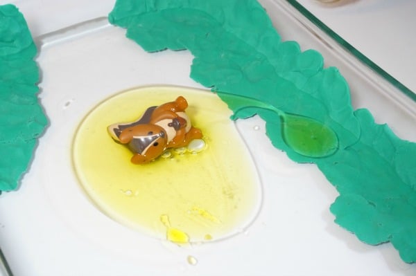 oil spill experiment clean water science animal clay hands