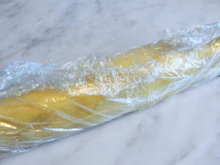 icebox sugar cookie dough wrapped in plastic wrap