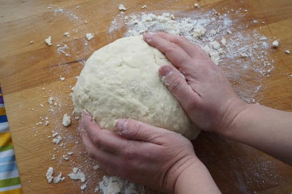 kneading soda bread ball of dough
