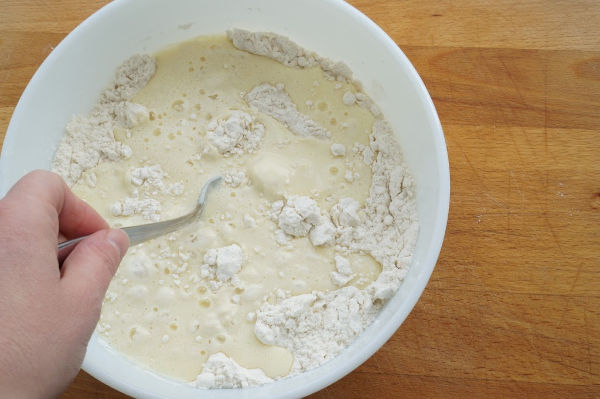 wet ingredients and dry ingredients with fork