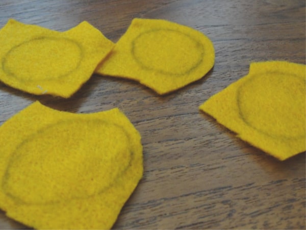 felt pumpkins ready to be cut out