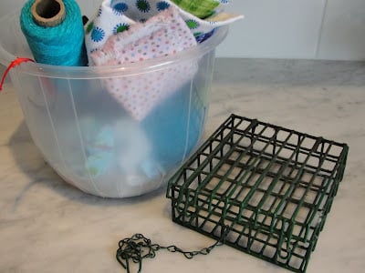 nesting supplies and suet cage