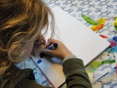 child drawing book artwork