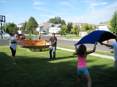 water balloon toss with towels