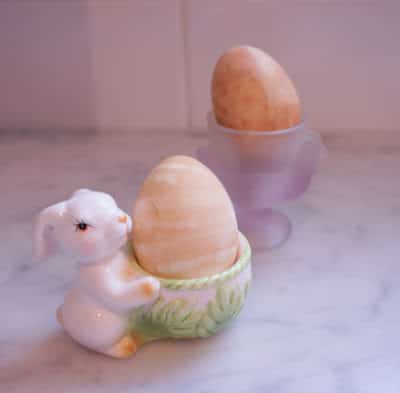 vegetable dyed easter eggs in egg cup