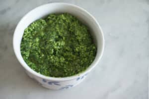 kale and garlic scape pesto in bowl