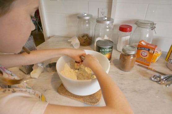 cutting in butter pumpkin biscuit