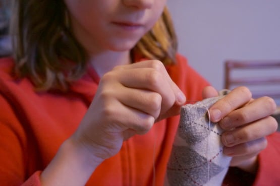 kid sewing