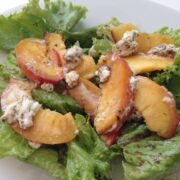 grilled peach salad in bowl