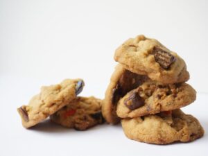close up of halloween candy cookies in pile