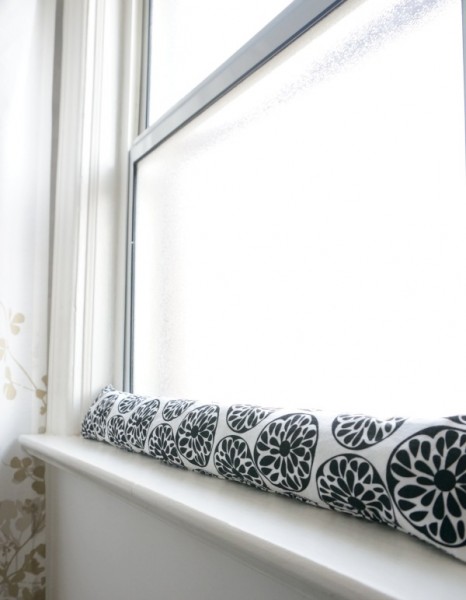 diy draft stopper place in a drafty window