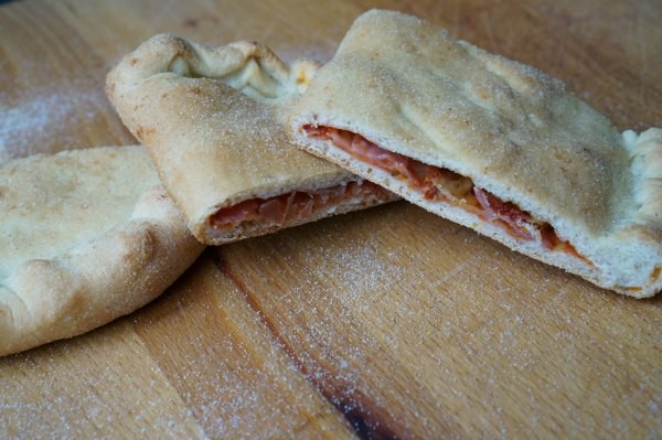 pizza filled calzone baked