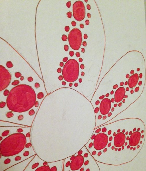 child made polka dot art on canvas inspired by yayoi kusama close up