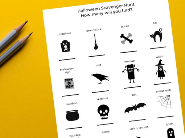 outdoor halloween scavenger hunt for kids printed out with pencils