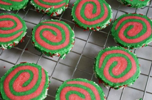 christmas pinwheel cookies on cooling rack