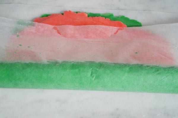 christmas pinwheel cookies rolled with waxed paper