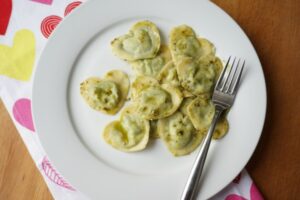 heart shaped ravioli with pesto