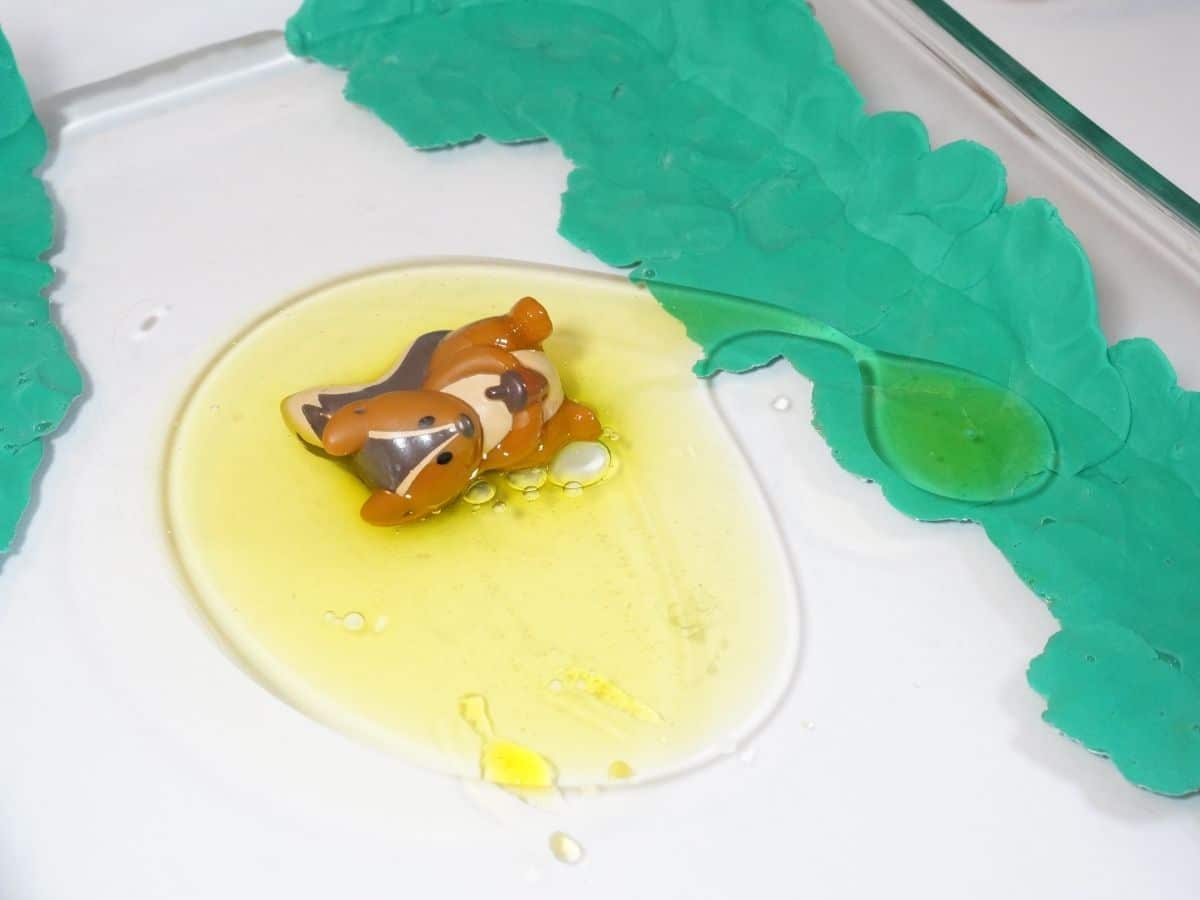 squirrel stuck in oil in ocean experiment