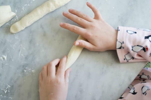 soft pretzel dough rolling