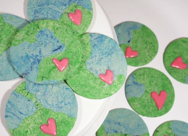 Earth Day sugar cookies on plate earth with heart