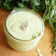 close up of green goddess dressing in a mason jar featured image