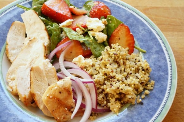 Spinach and strawberry chicken salad bowl