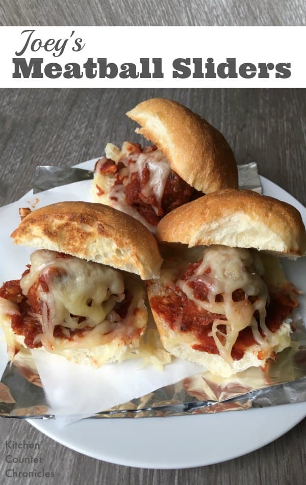 Meatball Sliders - Joey Tribiani loves sandwiches and pizza...perhaps his favourite being a meatball sandwich. We decided to make meatball sliders to eat for a Friend's themed dinner with the family. These delicious sliders would surely get Joey's stamp of approval. | Meatball Recipe | Meatball Sandwich | Family Dinner Recipe |