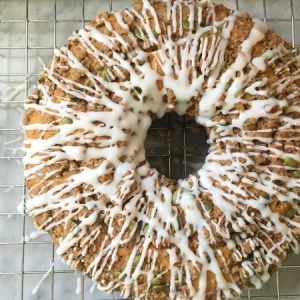 Pumpkin Coffee Cake with glaze - A delicious recipe for pumpkin coffee cake. Topped with a pumpkin spiced streusel and vanilla glaze. A delightful fall recipe. | Fall Recipe | Pumpkin Spice Recipe | Pumpkin Recipe | Coffee Cake Recipe |