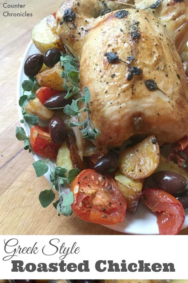 Greek Style Roast Chicken - Tired of the same old chicken? This oven roasted chicken embraces the flavours of Greece. Oregano, lemon, olives, tomatoes and more. Delicious family favourite recipe. | Greek Recipe | Oven Roasted Chicken Recipe | Roasted Vegetables |