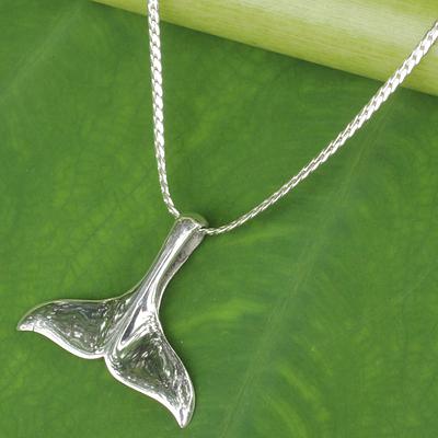 UNICEF whale tail pendant