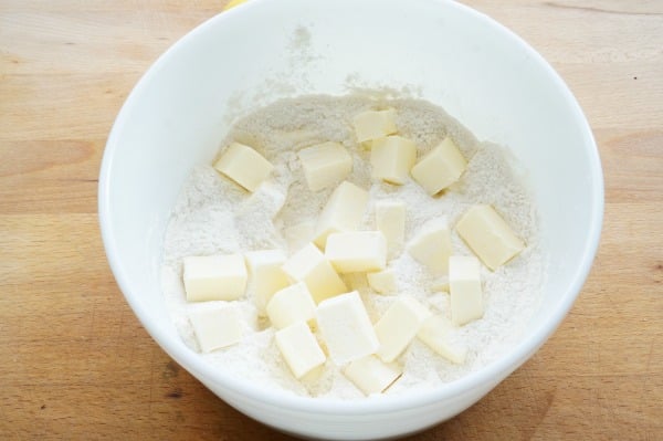 lemon bars with butter in bowl