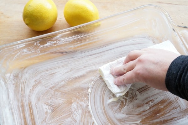 lemon bars buttering baking pan