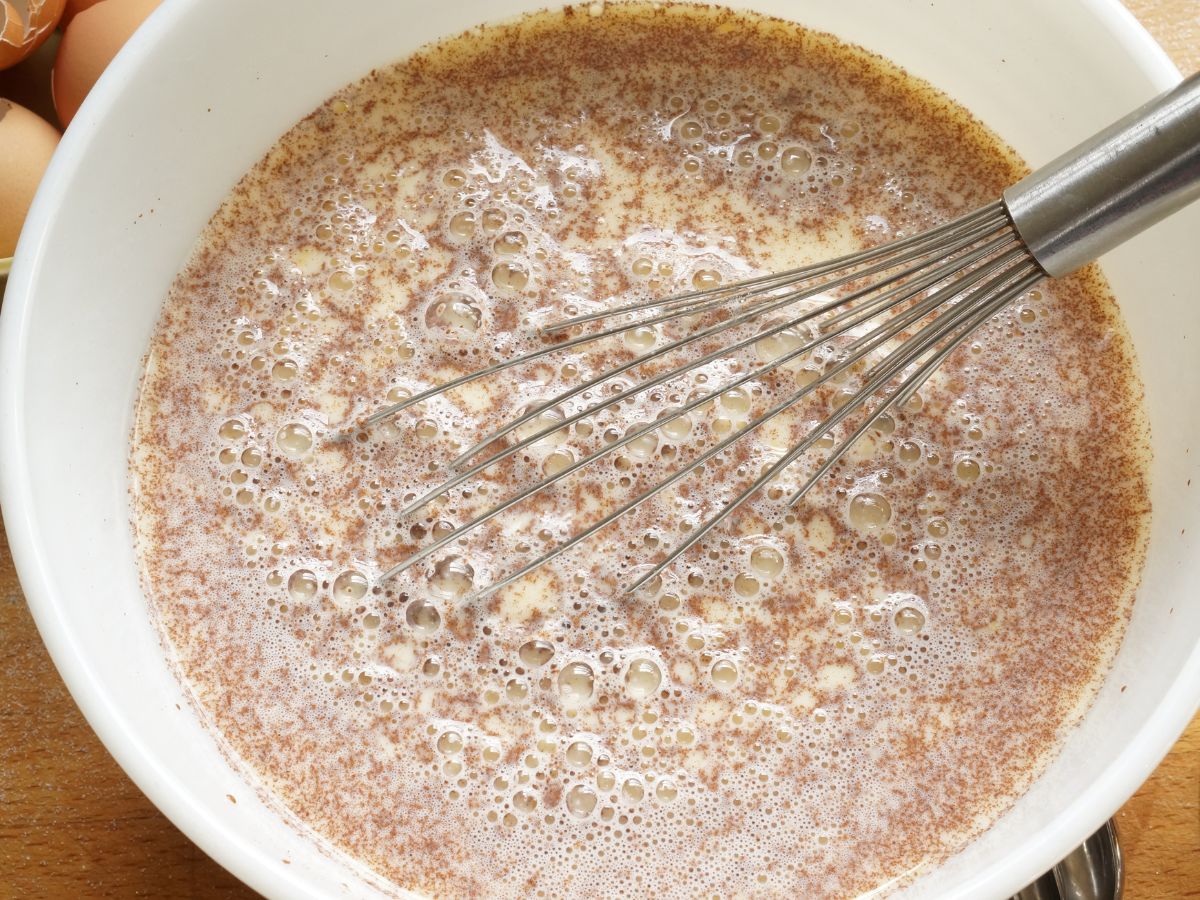 bowl of custard batter for bread pudding