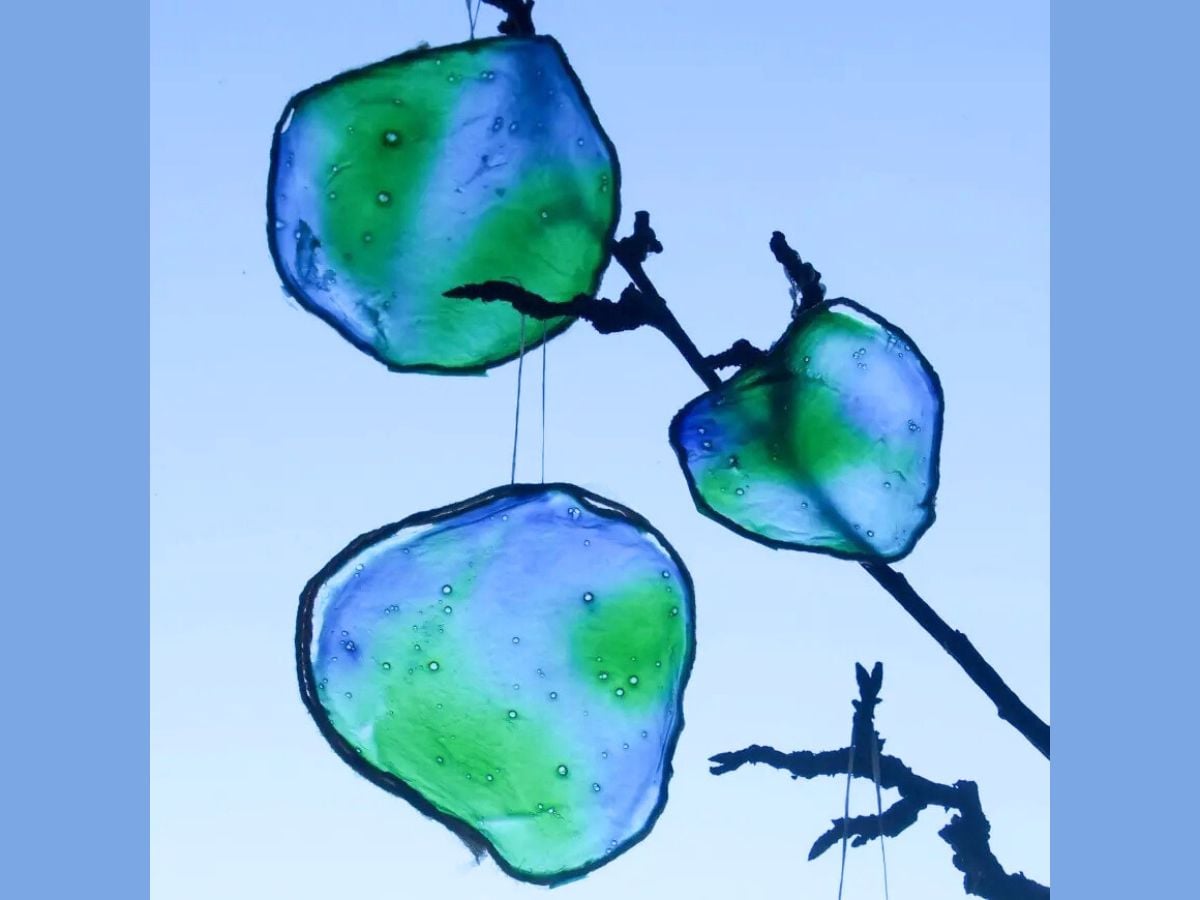 craft kid made Earth stained glass made with glue