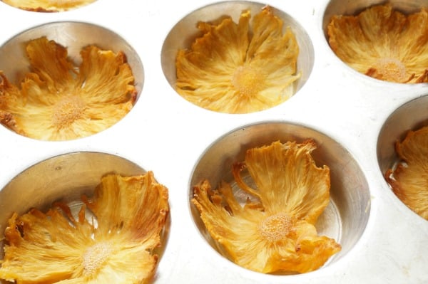 dried pineapple flowers in muffin tin