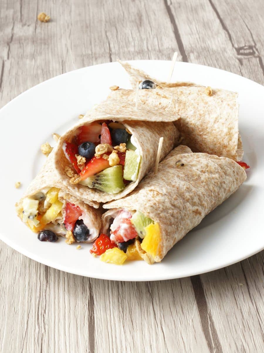 rainbow fruity breakfast burrito on plate