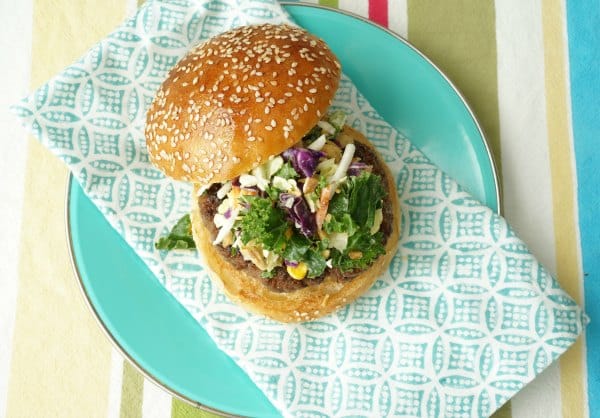 burger with topping on plate