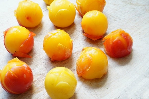 plums with skin peeling