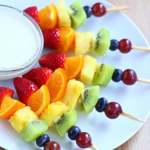 rainbow Fruit kebobs on plate