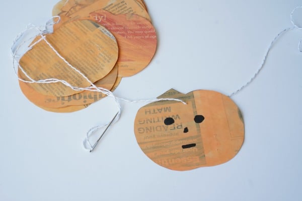 newspaper pumpkins on string