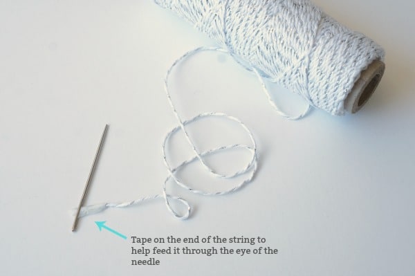 string with tape on the end