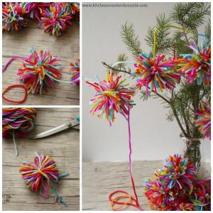 Boho Christmas Pom Pom Garland - A lovely kid-made Christmas garland inspired by Amelia from The Girl Who Saved Christmas. | #kidmadeornament #christmas #christmaskids #bohochristmas #bohopompomgarland #kidmadeornament