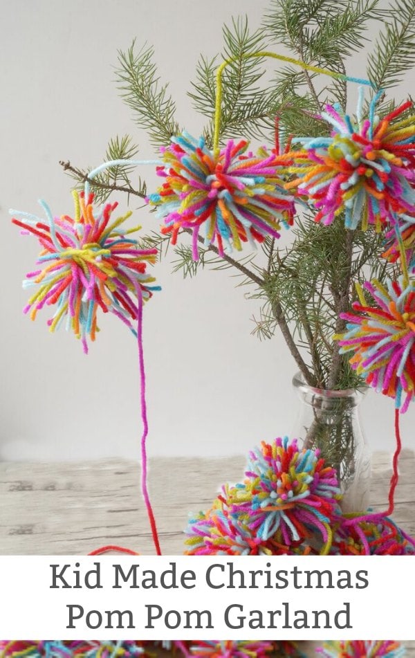 Boho Christmas Pom Pom Garland - A lovely kid-made Christmas garland inspired by Amelia from The Girl Who Saved Christmas. | #kidmadeornament #christmas #christmaskids #bohochristmas #bohopompomgarland #kidmadeornament