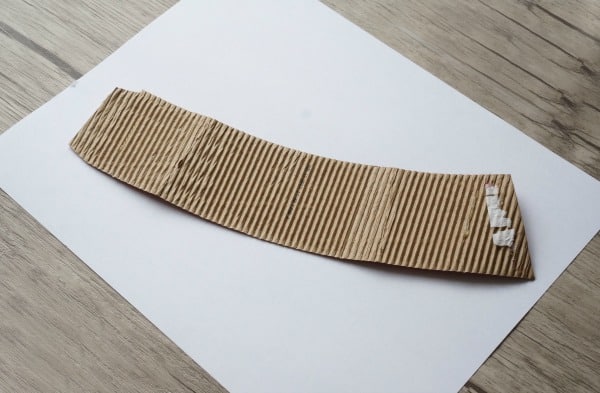 coffee cup sleeve on paper