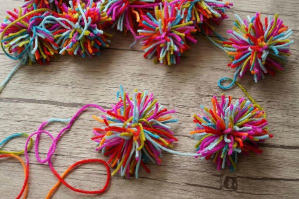 pom pom tied on garland