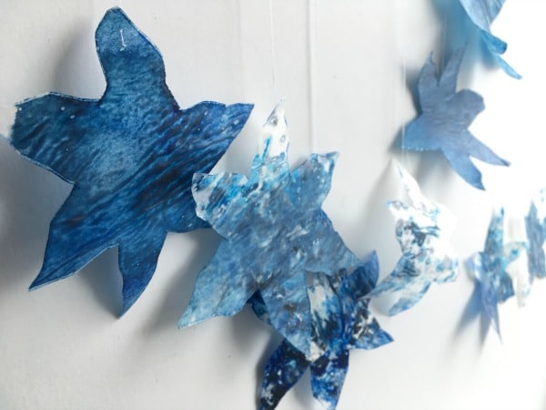 blue crayon snowflakes close up