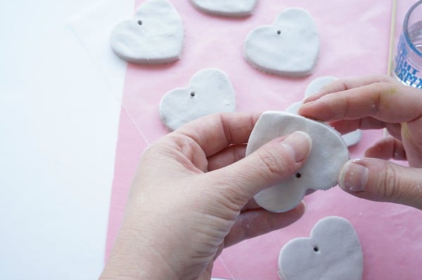 clay heart with wet fingers
