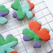 shamrock rainbow cookies on cooling rack