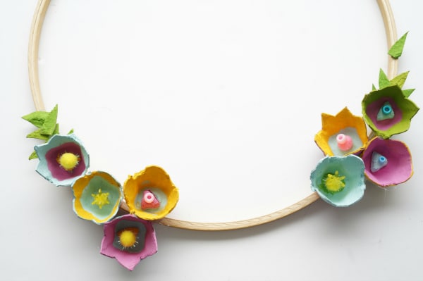 egg carton flowers glued on hoop