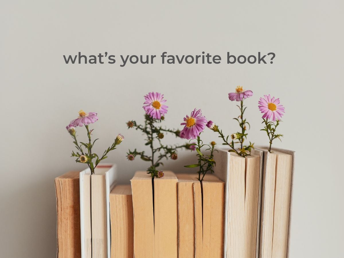 books on a shelf with flowers above it reads "what’s your favorite book?"